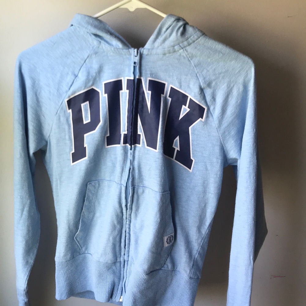 blue zip up sweatshirt